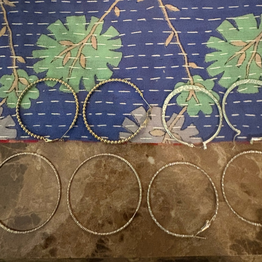 GUC set of 4 large hoop earrings silver tone and gold tone